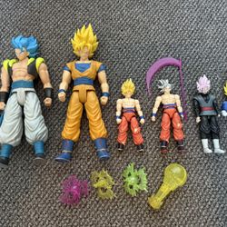 7 Dragon Ball/Goku action figures Two big 12 inch Goku action figures, 5 6inch goku action figures