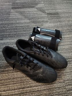 Adidas cleats and shin guards