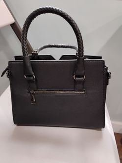 New black handbag without tags