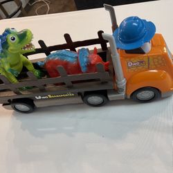 DINO TRANSPORTED TOY MAKE SOUNDS 