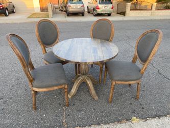 World market small dining table and four chairs
