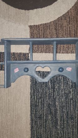 Wall Shelf Decor With Heart Design In The Middle