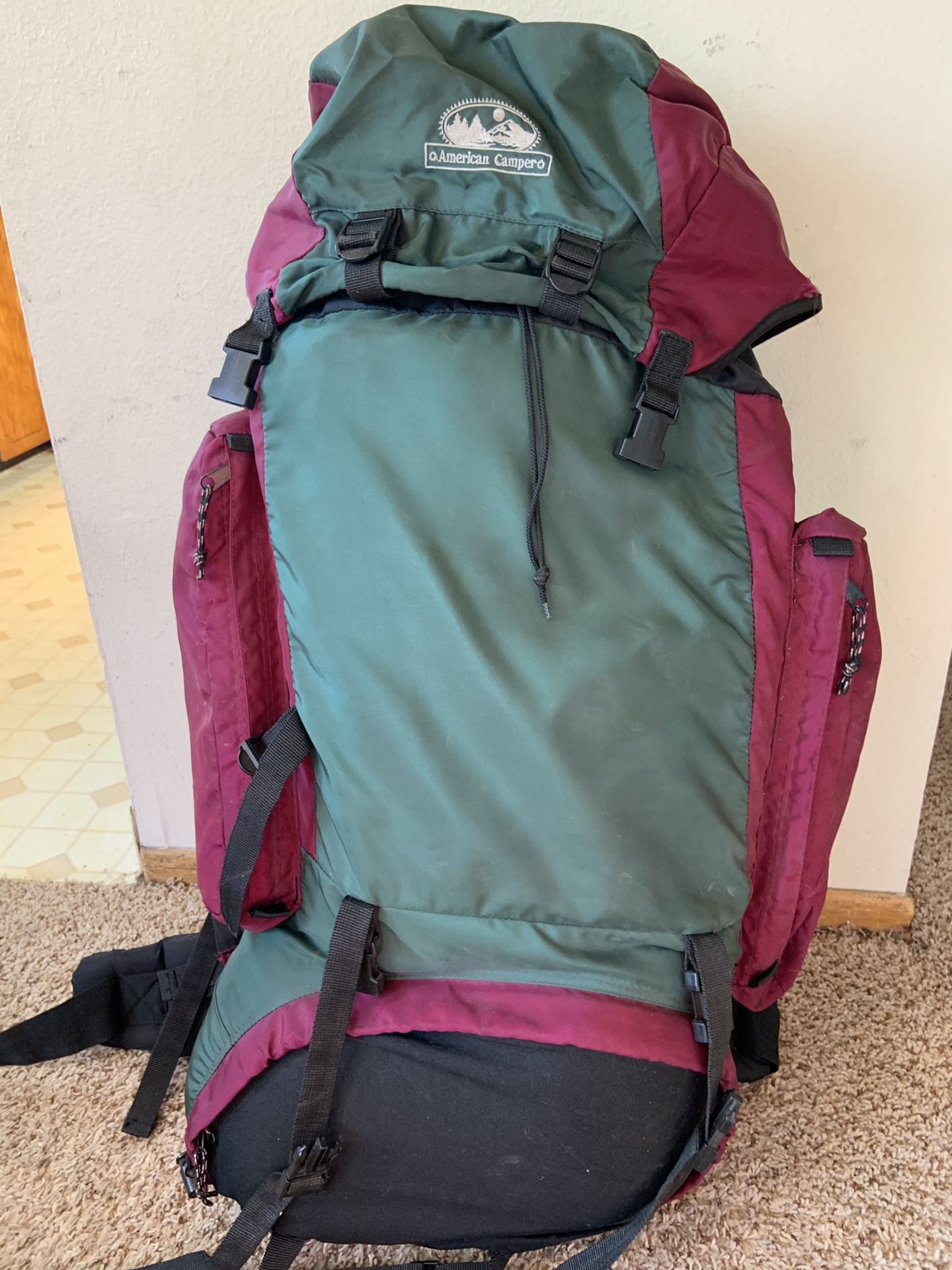 Hiking backpack with self inflating air mat