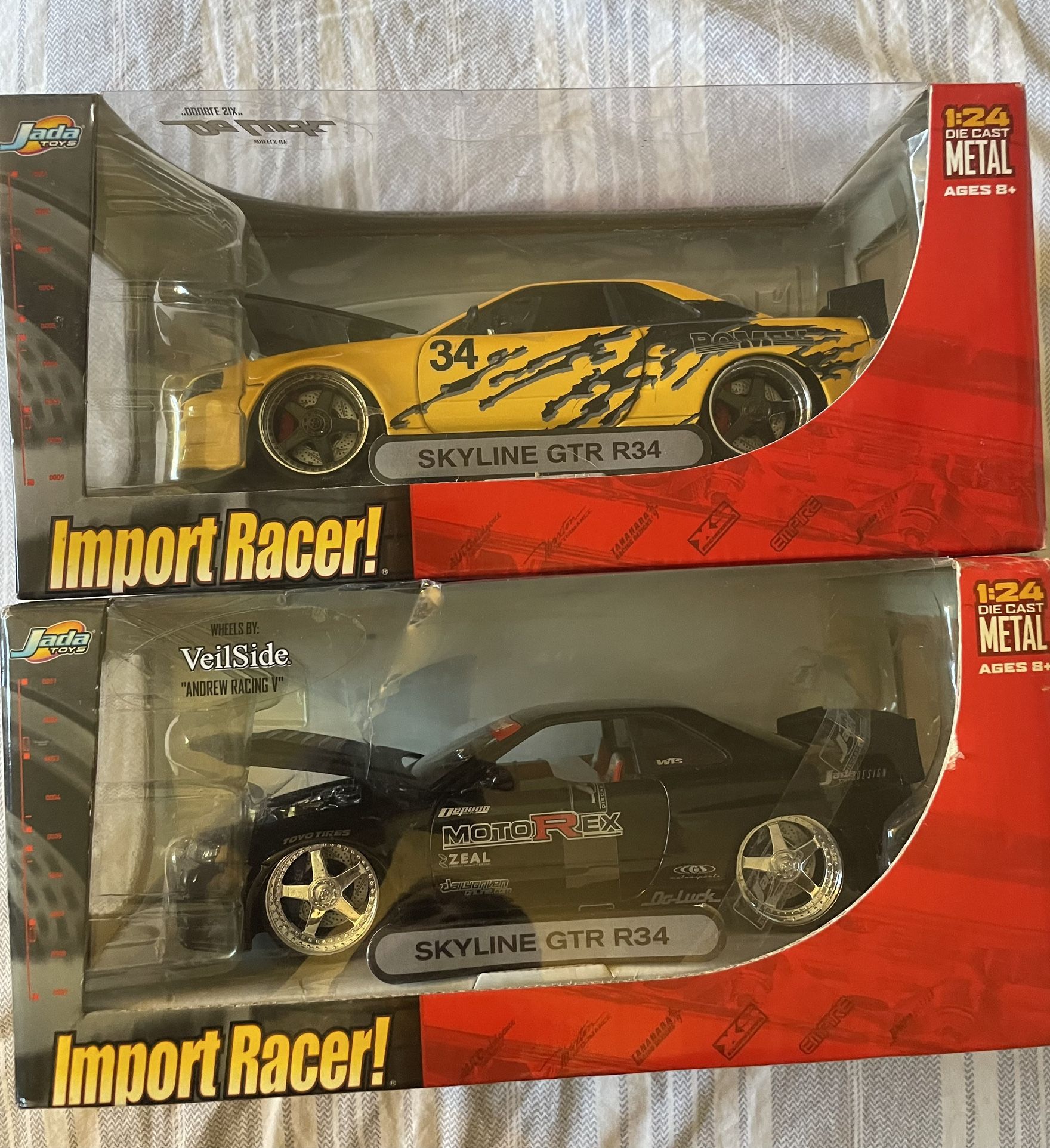 Import Racer Nissan Skyline GTR-34 1:24 Scale Yellow Bomex Striped + Black Diecast