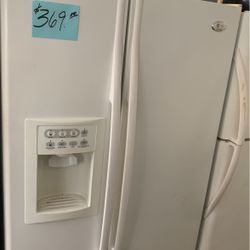 GE Side By Side Refrigerator White . Warranty  . Delivery Available . 2203 Fowler St. 33901
