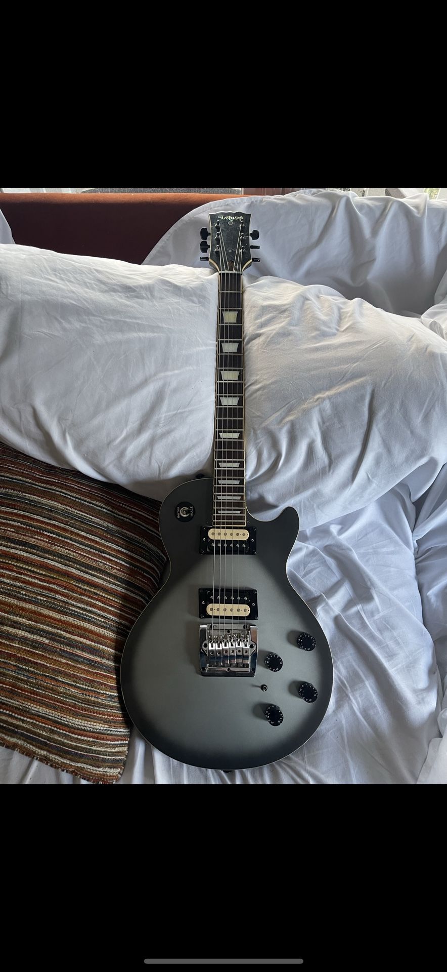 Lotus Silver bust LP Style Guitar Copy