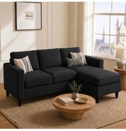 Black L shaped microfiber couch