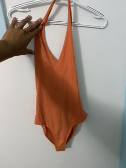 Orange bodysuit