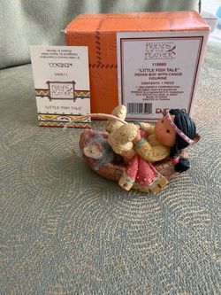 Enesco Friends of the feather by Enesco 115665 Little fish tale Indian boy with canoe figurine 1994 Approx 2.5” x 4”