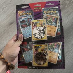 Pokémon TCG: 3 Team Rocket's Pokémon with 2 Booster Packs & Coin