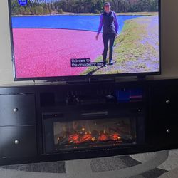 70" Vizio TV  with  75" Bluetooth/ Electronic Fireplace Tv Stand