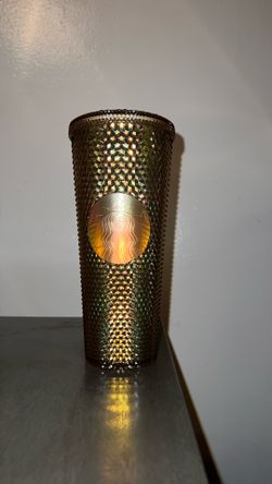 Disneyland Resort Starbucks-style studded tumbler with an iridescent bronze/gold finish