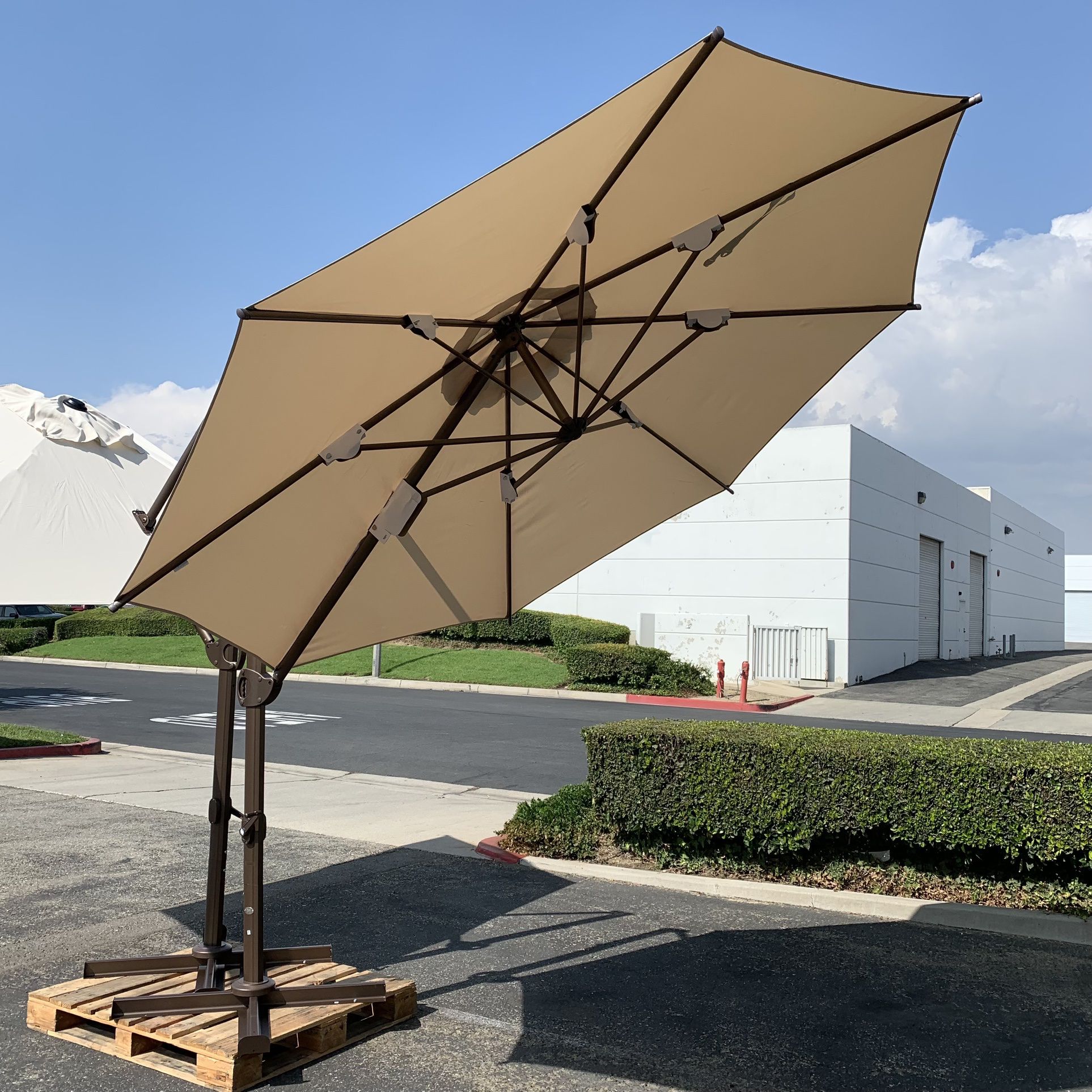 Similan 11 ft Outdoor Round Offset Cantilever Umbrella with Umbrella Base Weights