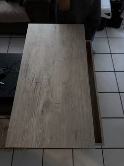 Tablet with a lift & to put shoes underneath