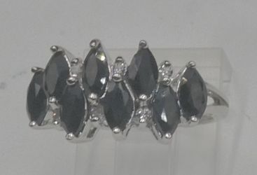 925 STERLING SILVER RING SIZE 7.25 3.5 GRAMS W 8 BLUE MARQUISE SHAPE STONES   AND 6 CUBIC ZIRCONIA STONES. 890199-6.