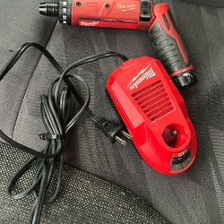 Milwaukee M4 Drill With Battery And Charger