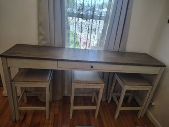 Console table with three chairs