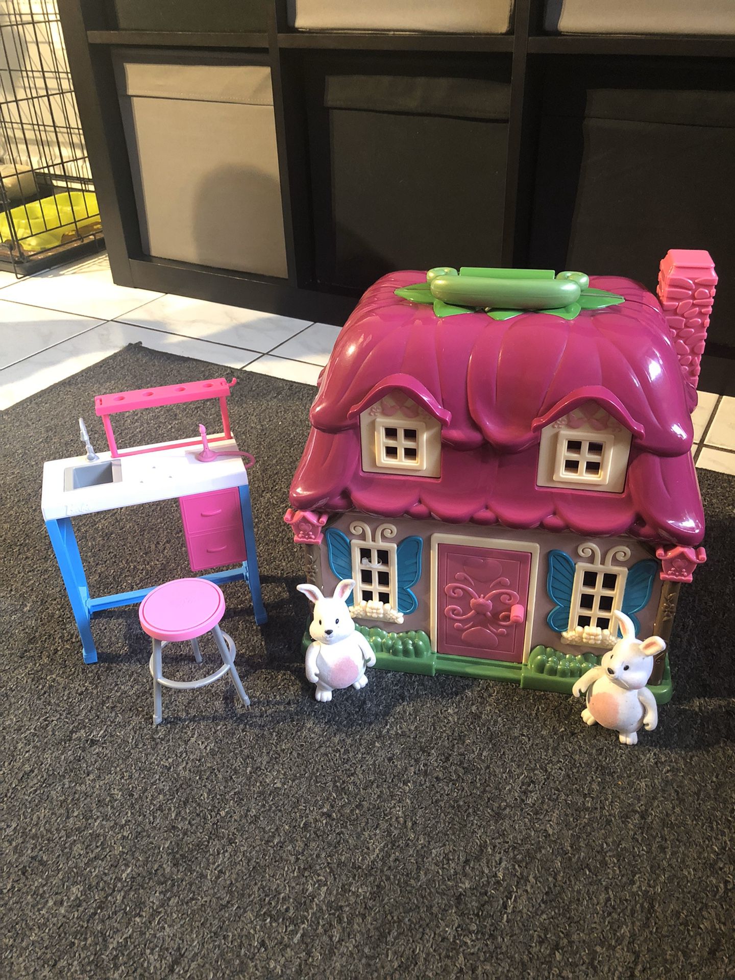 Doll house with figures and Barbie stuff
