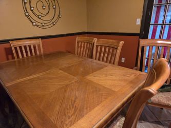Oak table with leaf and 8 chairs