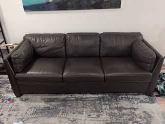 Two dark brown leather couches