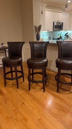 Front gate, leather barstools, brown, studded, nails bar height
