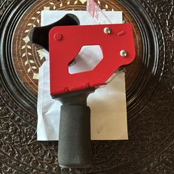 Hand held tape dispenser for 2” wide tape