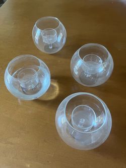 Set of 4 round glass tea light holders