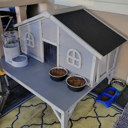 Wooden outdoor cat house