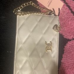 Brand new authentic Juicy contour cream color pouch with gold hardware