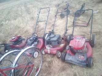 Four junk mowers