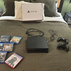 PS4 Console And 8 Game Discs 