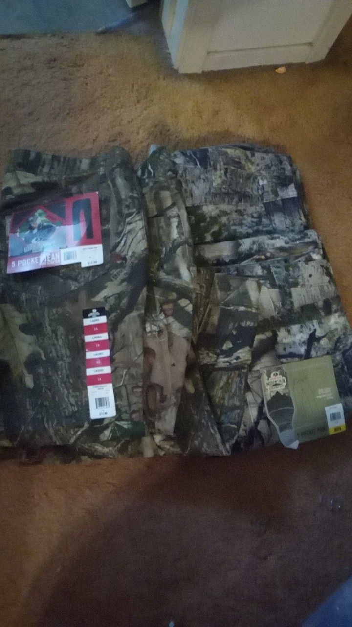 Two ladies pants size 14 and 12 and two men's pants size 38 32 32 30