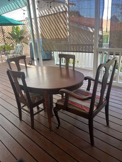 Antique dining table and chairs