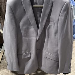 2 grey suit slim fit. One 38R, Other 42R