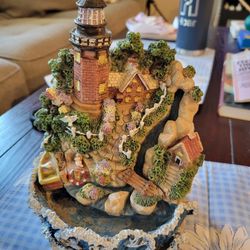 Lighthouse waterfall ornament. Audio works, water feature does not