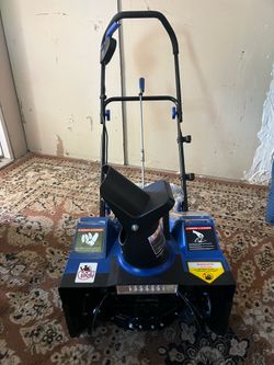Snowblower with batteries and charger