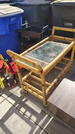 Vintage bamboo glass cart ,has wheels