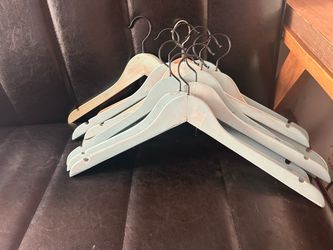 Wooden hangers, pastel blue