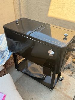 Black Rolling Patio Cooler Cart with ice scoop and cover