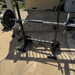 Olympic Weight Plates, Barbell, and Rack