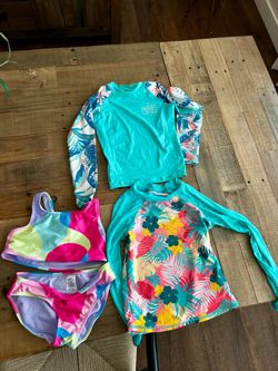 Girl bathing suit and rash guards