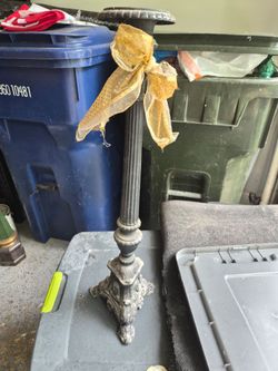 Cast iron floor candle holder