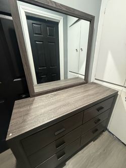 Gray dresser with mirror