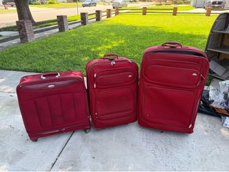3-Piece Samsonite Red Luggage Set used