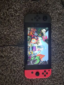 Nintendo Switch with Red and Black Joy-Cons