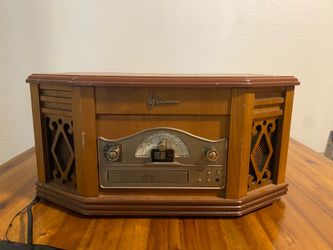 Emerson 4-in-1 retro Record player, CD player, tape/ cassette deck player, ad AM/FM radio