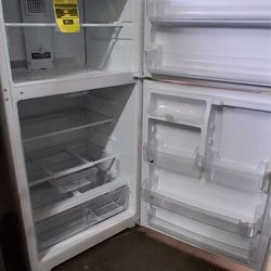 New GE refrigerator with 1 yr warranty