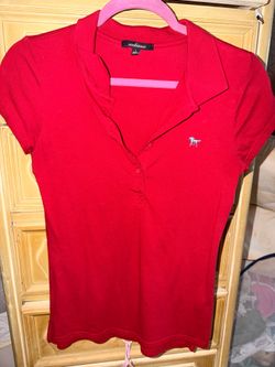 Women’s red polo shirt