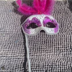 Halloween Pink And White Masquerade Mask With Feathers.