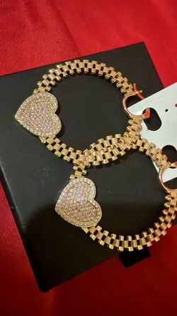 Rolex Heart Earrings.